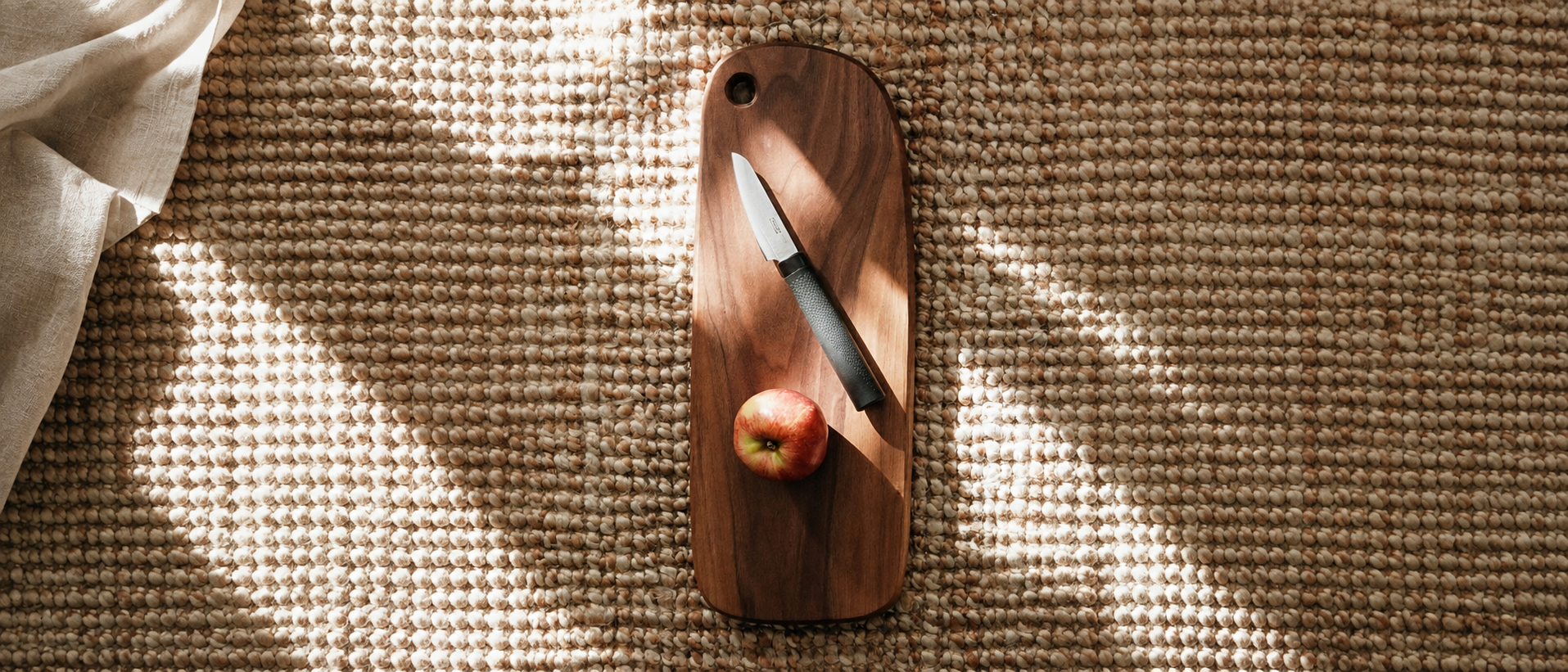 Natural kitchen essentials with wooden cutting board